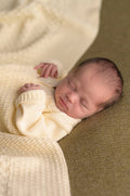 Quadratische rohe Babydecke